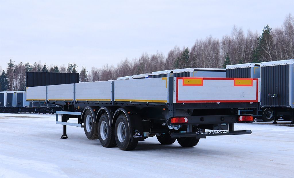 Бортовой полуприцеп с кониками Тонар B3-13/K | GoodTruck